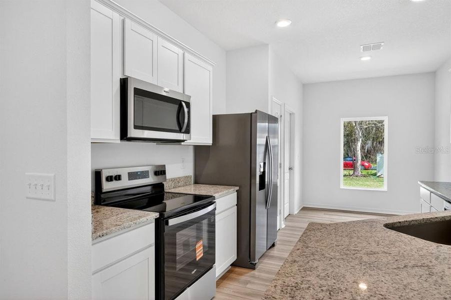 Furnished interior view inside a new home in , Deltona (Image 12).