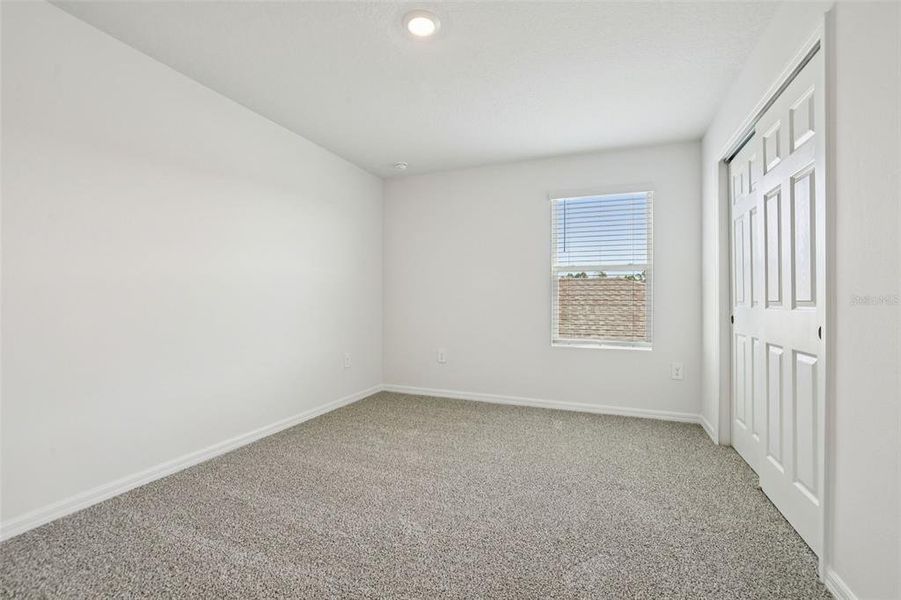 Spacious, unfurnished interior of a new home in Lake Deer Estates - Signature Series, Poinciana (Image 34).