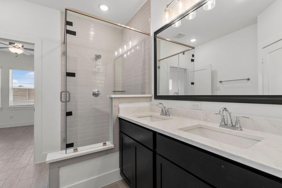 Furnished interior view inside a new home in Meridiana, Iowa Colony (Image 11).