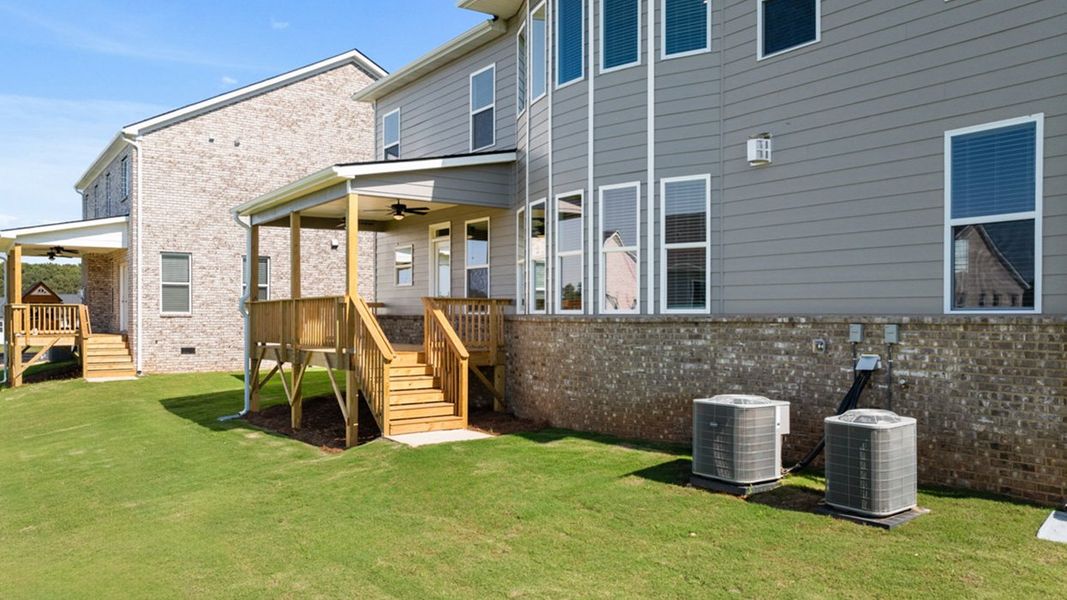 Front exterior of a new home in Heritage Pointe, Senoia, GA, highlighting curb appeal (Image 34). Front exterior of a new home in Heritage Pointe, Senoia, GA, highlighting curb appeal (Image 34).