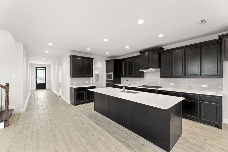 Representative exterior photo of a completed home built from the Winchester by Impression Homes in Timberbrook, Justin, TX (Image 7).