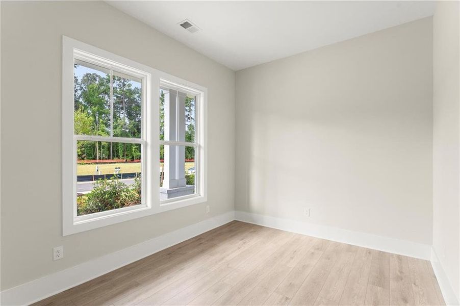 Spacious, unfurnished interior of a new home in Hillgrove Preserve, Powder Springs (Image 24).