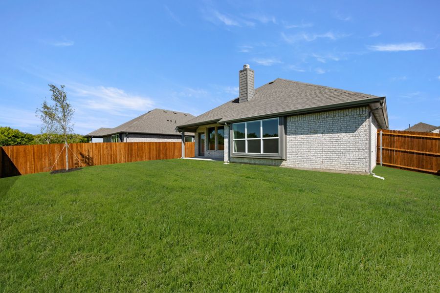 Exterior details and patio area of a home in Hunters Ridge, Crowley (Image 20).