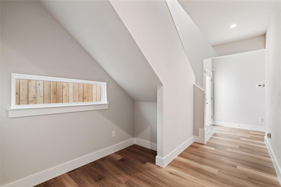 A dedicated mudroom-style entry just off the garage, designed to keep daily clutter contained before you step into the home.