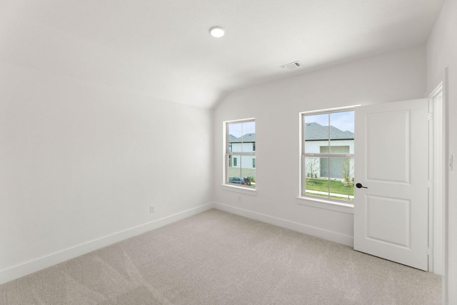 Spacious, unfurnished interior of a new home in Cottage Collection at Harvest, Argyle (Image 25).