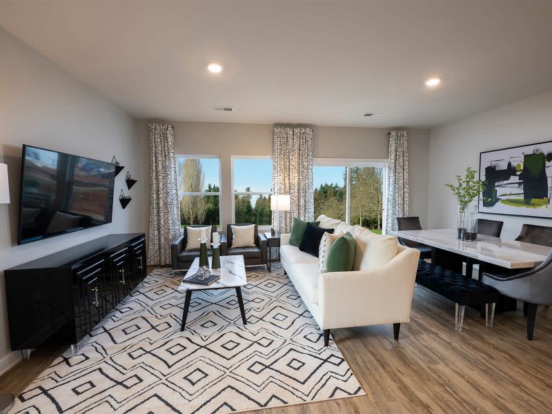 Enjoy family nights in the spacious great room. Photography from Foxcroft Townes. Enjoy family nights in the spacious great room. Photography from Foxcroft Townes.