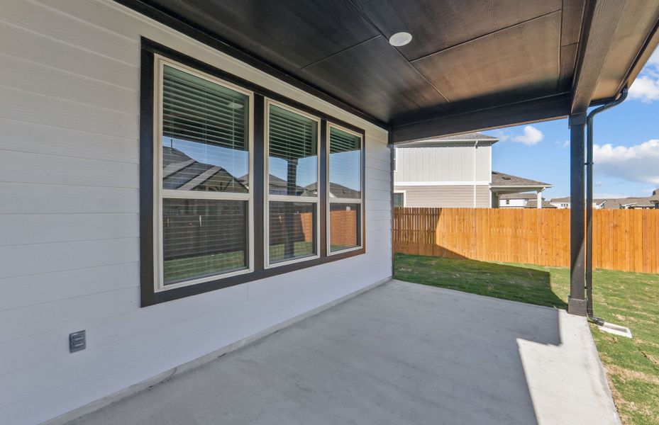 Exterior details and patio area of a home in Santa Rita Ranch, Liberty Hill (Image 25).