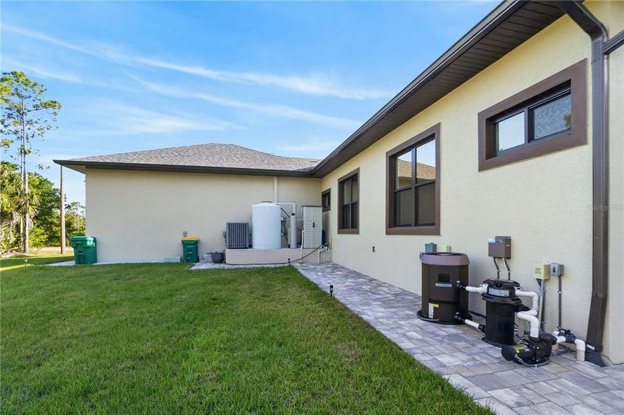 Exterior details and patio area of a home in , Port Charlotte (Image 48).