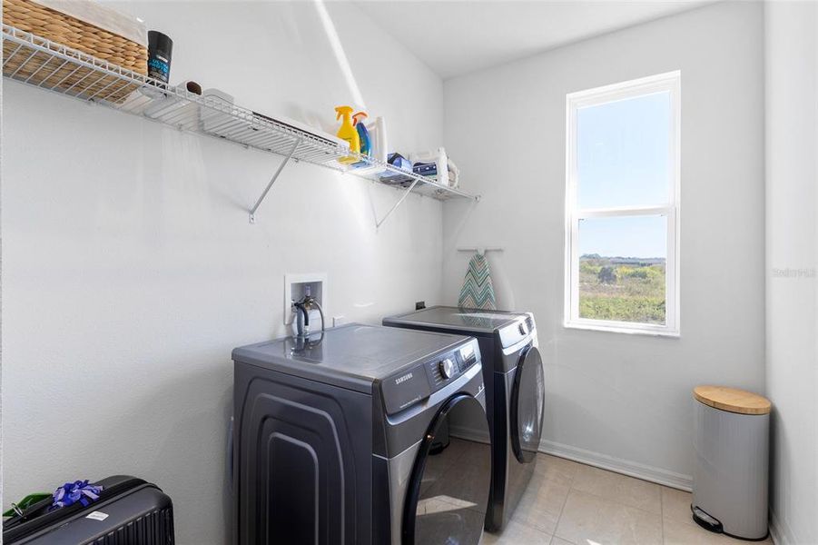 Furnished interior view inside a new home in Isles at Bayview, Parrish (Image 33).