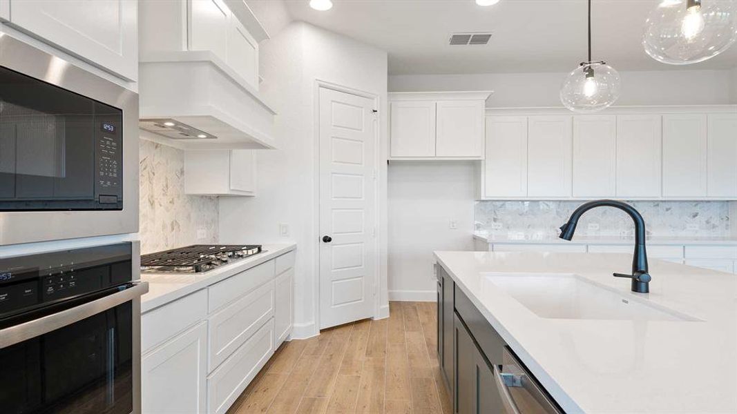 Furnished interior view inside a new home in Devonshire 55', Forney (Image 6). Furnished interior view inside a new home in Devonshire 55', Forney (Image 6).