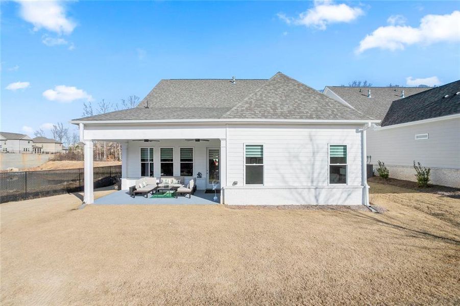Exterior details and patio area of a home in Courtyards at Traditions, Cumming (Image 3).