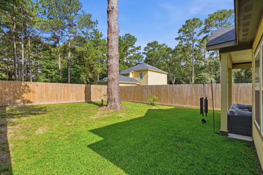 Exterior details and patio area of a home in , Conroe (Image 4). Exterior details and patio area of a home in , Conroe (Image 4).