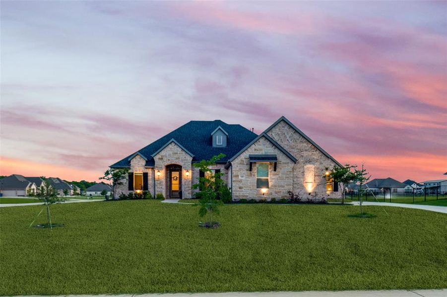 Front exterior of a new home in Lynx Hollow Estates, Forney, TX, highlighting curb appeal (Image 23).