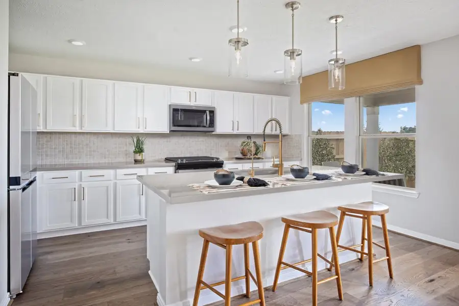 Representative furnished interior of a home built from the 2429 by KB Home in Oakwood Preserve, Tomball (Image 5).