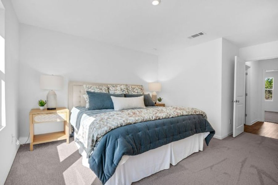 A bed in a room. A bed in a room.