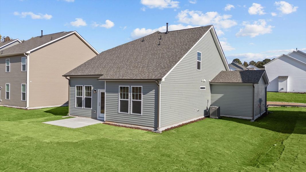Representative exterior photo of a completed home built from the Freesia by DRB Homes in Essex Village, Franklinton, NC (Image 28).
