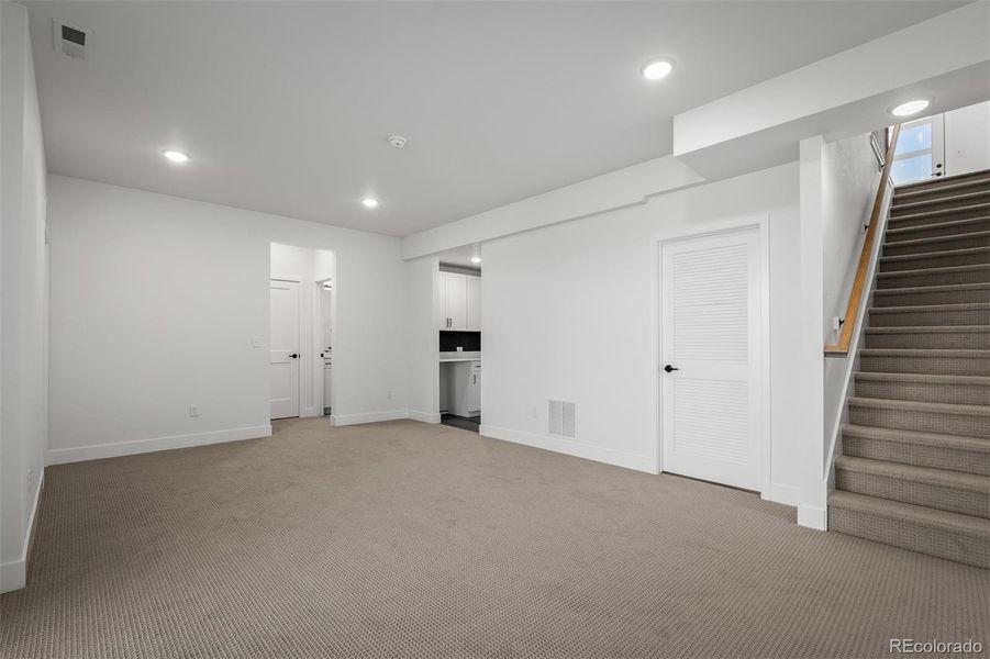 Spacious, unfurnished interior of a new home in Revel Crossing at Wolf Ranch - The Panorama Collection, Colorado Springs (Image 39).