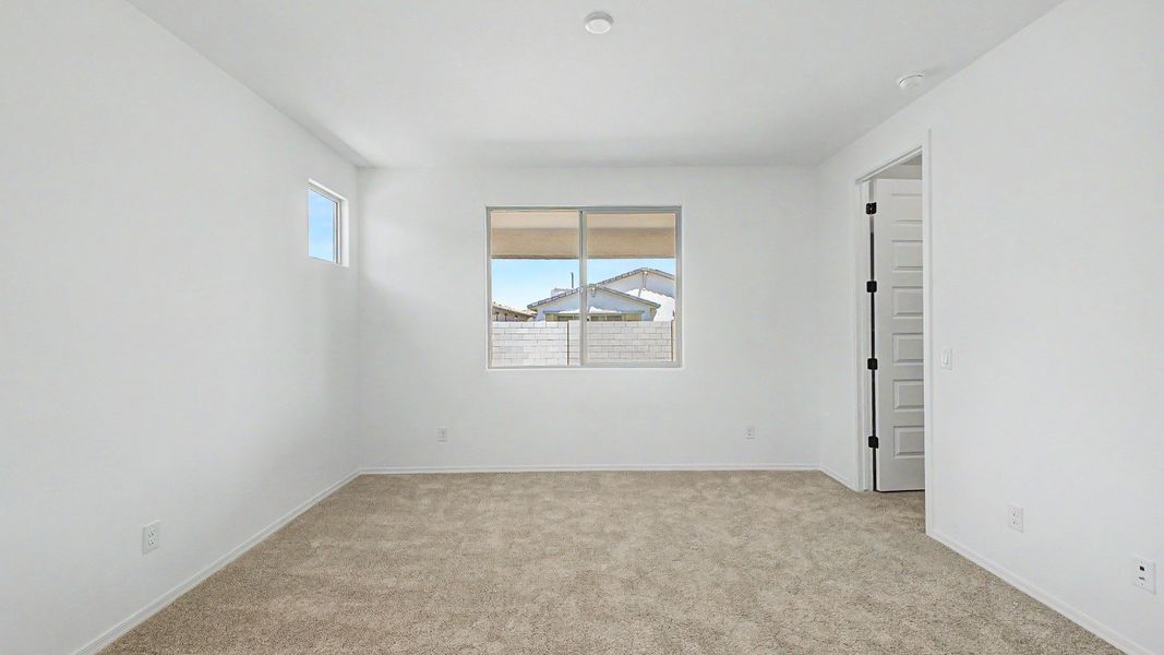 Representative furnished interior of a home built from the Acacia II by DRB Homes in Apache Farms, Buckeye (Image 13).