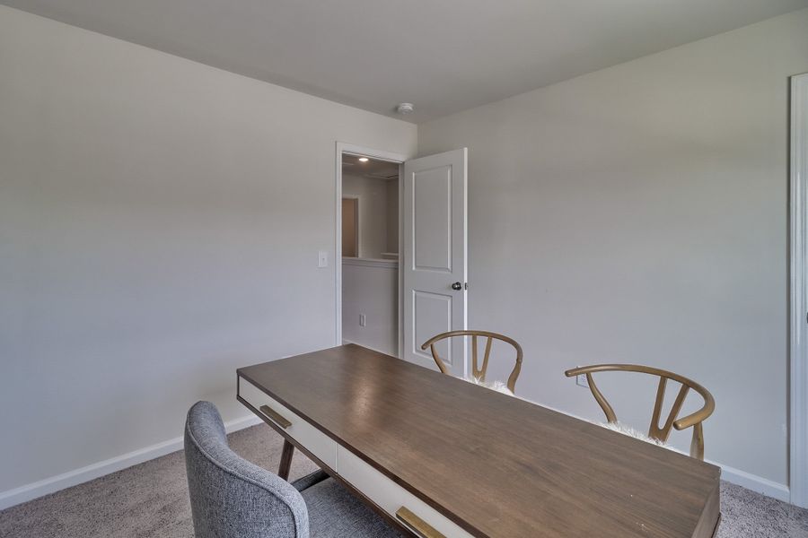 Representative furnished interior of a home built from the Poplar A by McGuinn Homes in Reserve at Mill Creek, Columbia (Image 14).