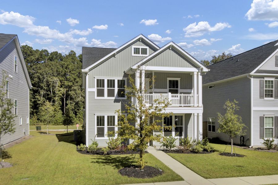 Front exterior of a new home in Six Oaks, Summerville, SC, highlighting curb appeal (Image 27).