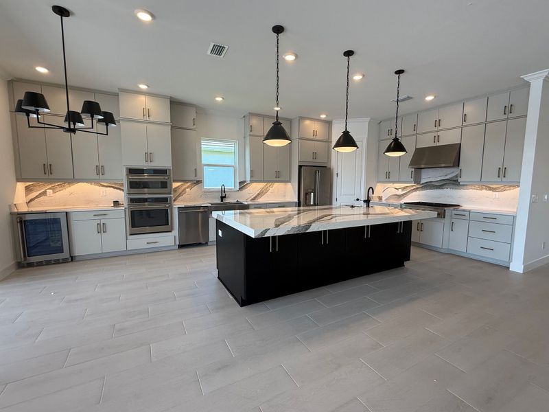Furnished interior view inside a new home in Esplanade Lake Club, Fort Myers (Image 6).