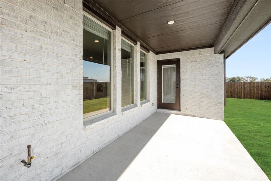Exterior details and patio area of a home in East Oak Creek 50-55, Commerce (Image 23). Exterior details and patio area of a home in East Oak Creek 50-55, Commerce (Image 23).