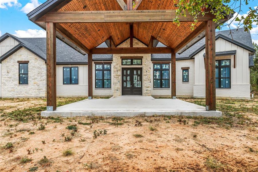 Front exterior of a new home in , Tolar, TX, highlighting curb appeal (Image 22). Front exterior of a new home in , Tolar, TX, highlighting curb appeal (Image 22).