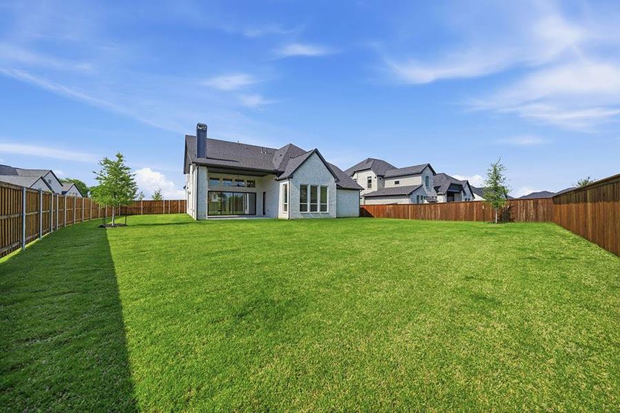 Exterior details and patio area of a home in Light Farms Graham/Reagan, Celina (Image 4).