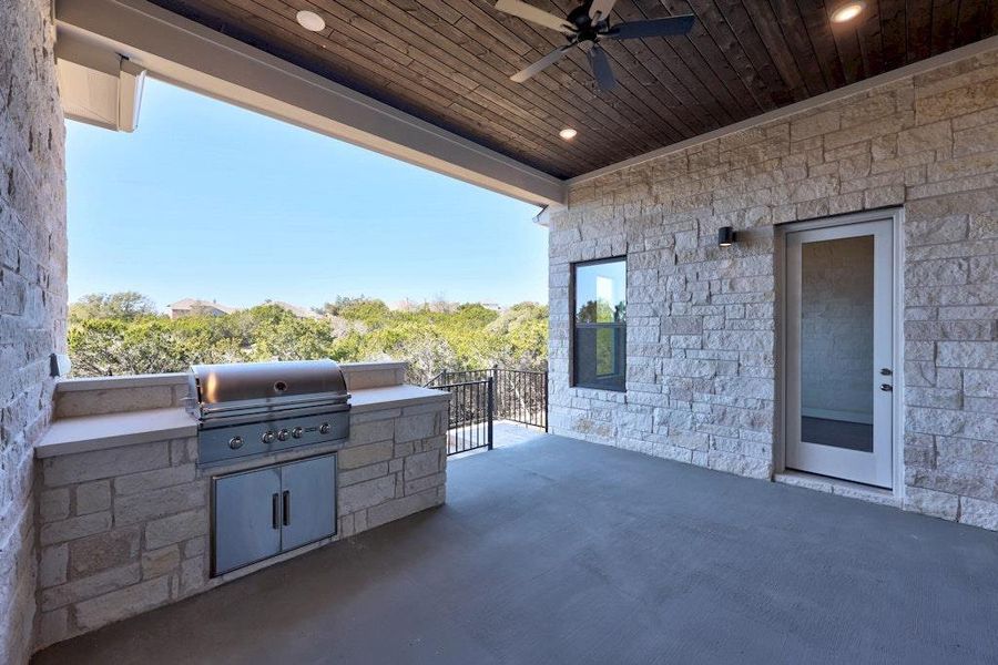 Exterior details and patio area of a home in Riverstone, Georgetown (Image 3).