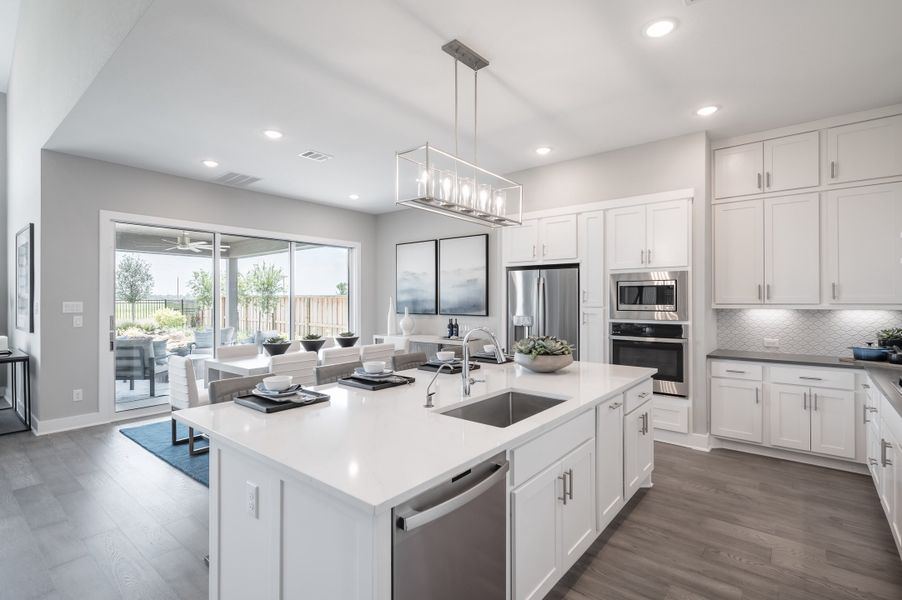Representative furnished interior of a home built from the Barnhart by Tri Pointe Homes in Dunham Pointe, Cypress (Image 9).