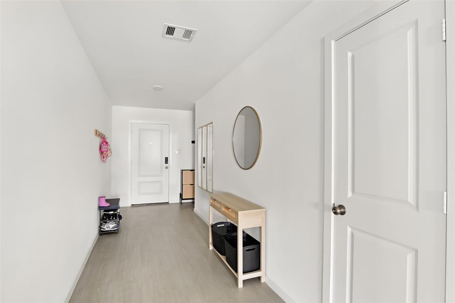 Entry view; door on the right is the 1/2 bath.