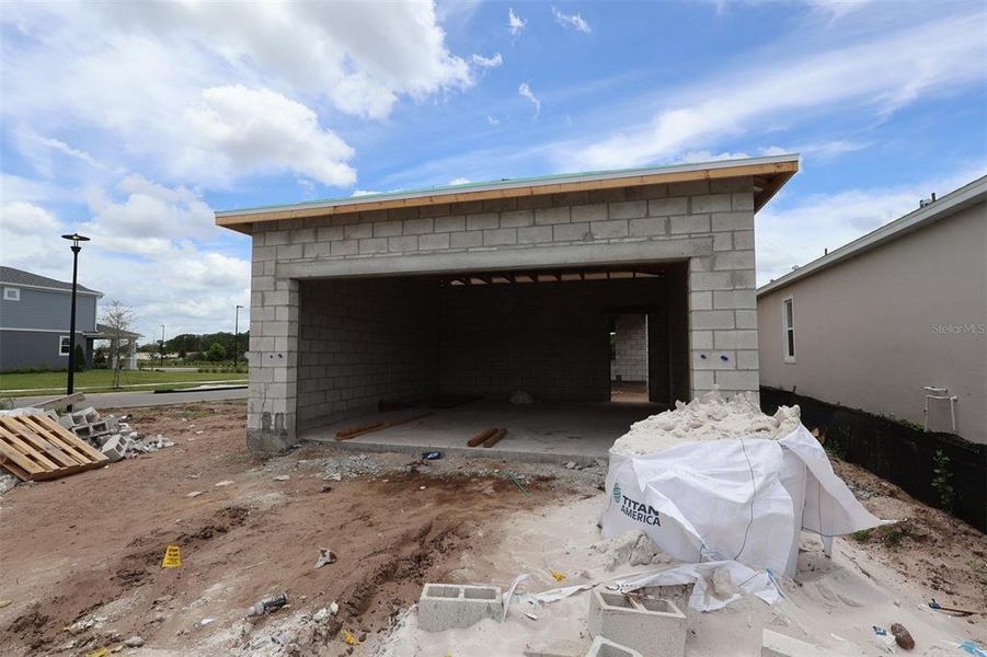 In-progress construction of a new home in Center Lake on the Park, St. Cloud, FL (Image 8).