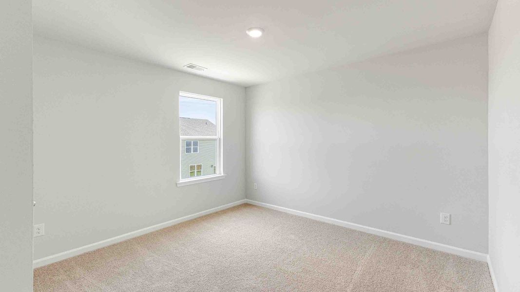 Spacious, unfurnished interior of a new home in Cedar Hill Landing, Navassa (Image 33). Spacious, unfurnished interior of a new home in Cedar Hill Landing, Navassa (Image 33).