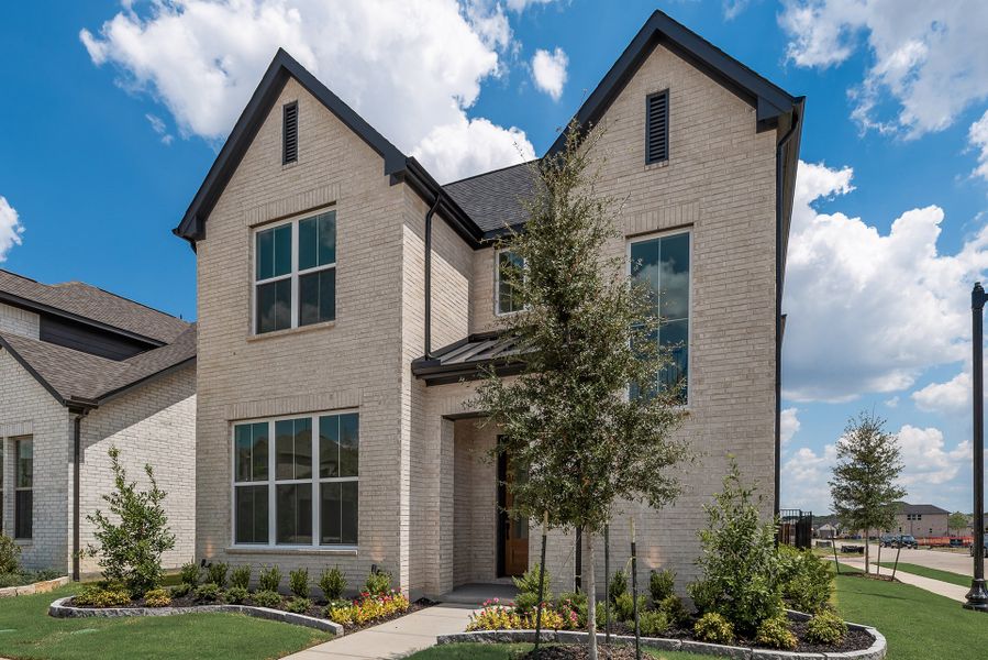 Front exterior of a new home in Cottages of Celina, Celina, TX, highlighting curb appeal (Image 22). Front exterior of a new home in Cottages of Celina, Celina, TX, highlighting curb appeal (Image 22).