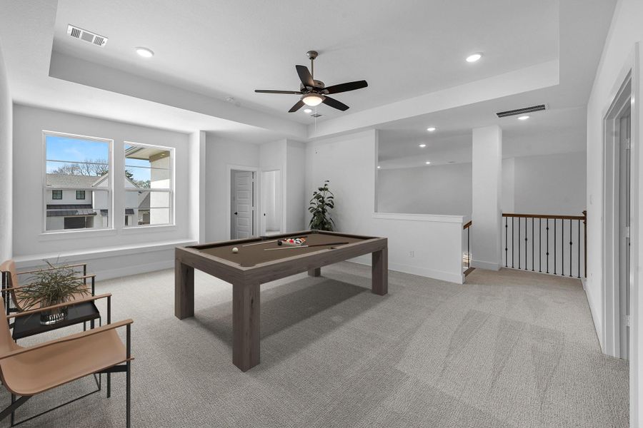 Furnished interior view inside a new home in Bridgeland, Cypress (Image 9).