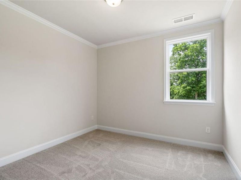 Spacious, unfurnished interior of a new home in Wehunt Meadows, Hoschton (Image 26).