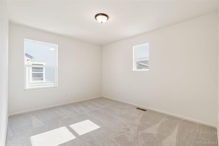 Spacious, unfurnished interior of a new home in Turnberry, Commerce City (Image 32).