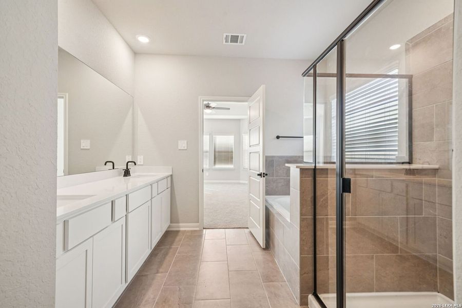 Furnished interior view inside a new home in Estancia Ranch - Classic Series, San Antonio (Image 9).