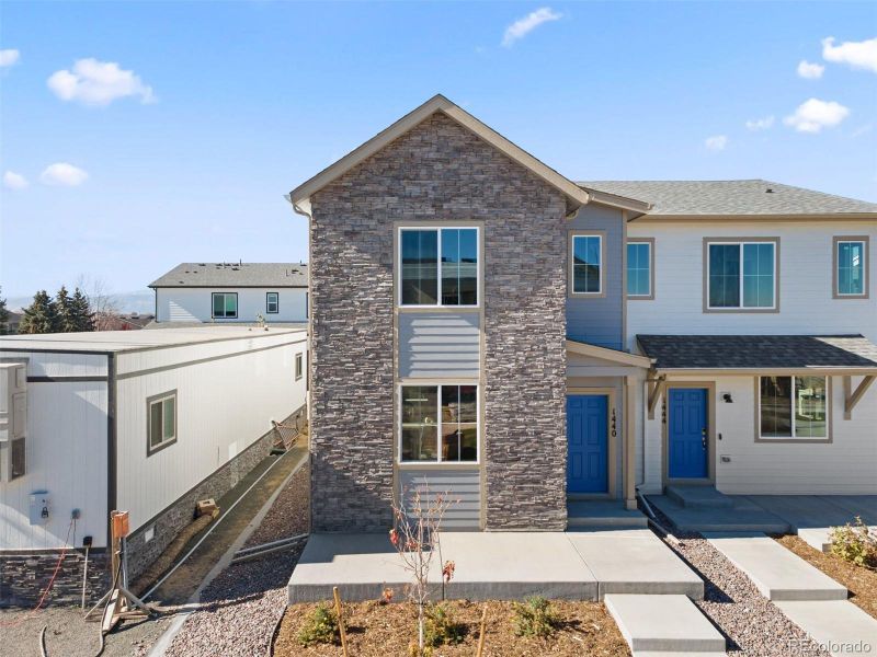 Front exterior of a new home in , Longmont, CO, highlighting curb appeal (Image 2). Front exterior of a new home in , Longmont, CO, highlighting curb appeal (Image 2).