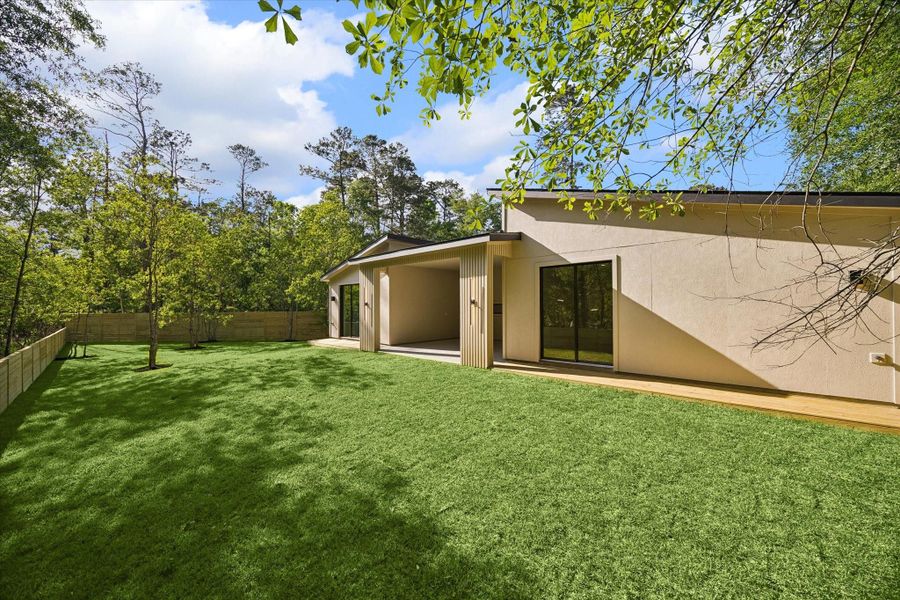 Exterior details and patio area of a home in , Conroe (Image 19).