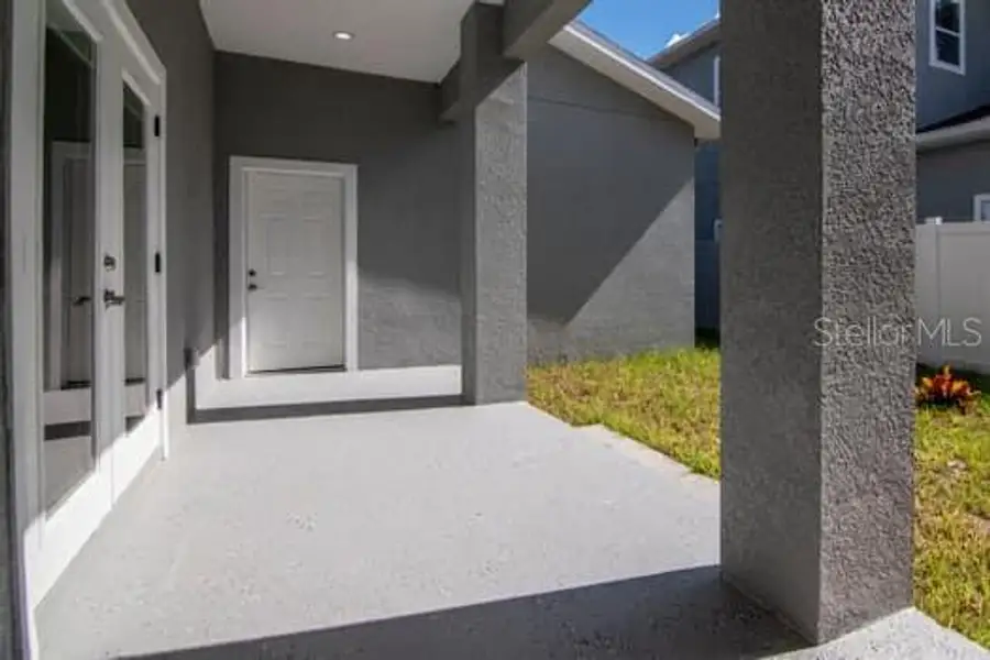 Exterior details and patio area of a home in , Tampa (Image 3).