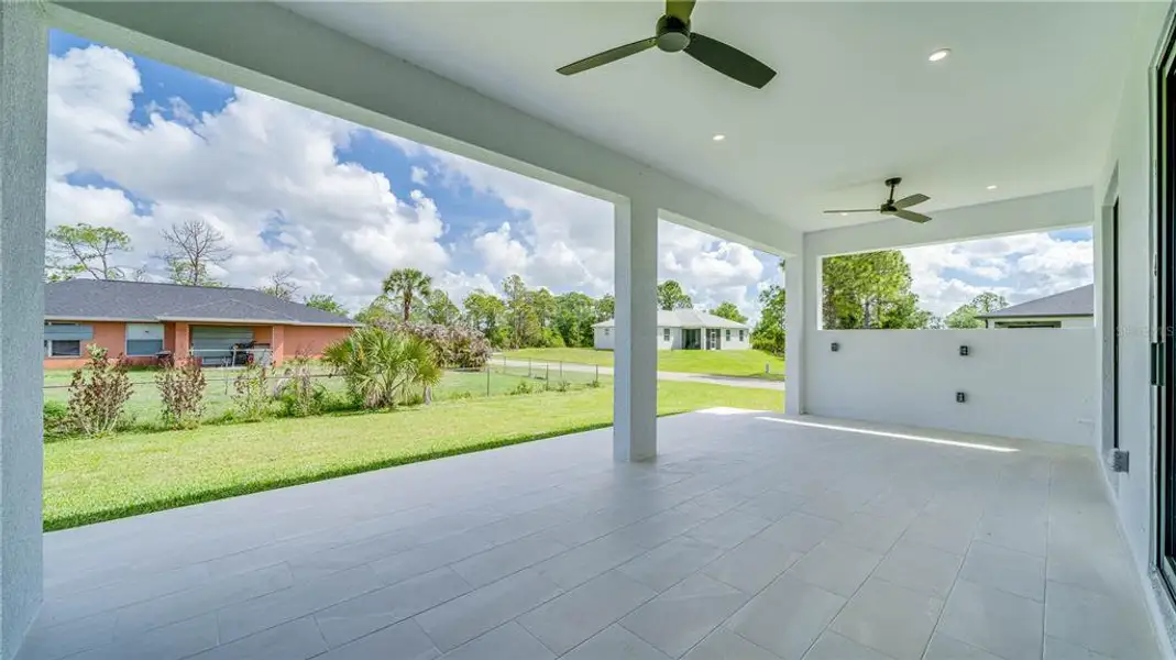 Exterior details and patio area of a home in , Lehigh Acres (Image 4).