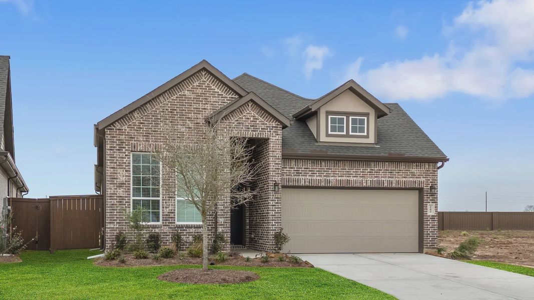 Representative exterior photo of a completed home built from the Oakley by Chesmar Homes in Brookewater 45's, Rosenberg, TX (Image 15).