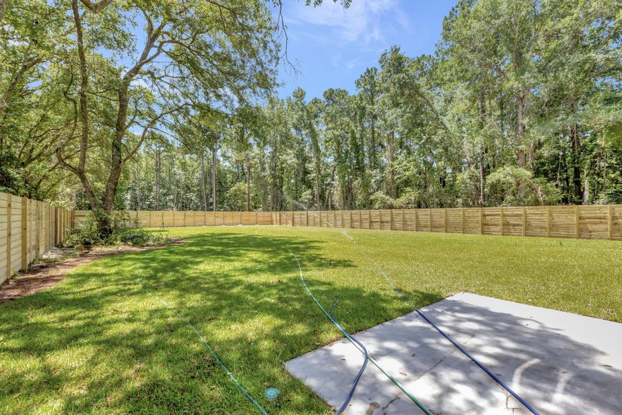 Front exterior of a new home in , Awendaw, SC, highlighting curb appeal (Image 14). Front exterior of a new home in , Awendaw, SC, highlighting curb appeal (Image 14).