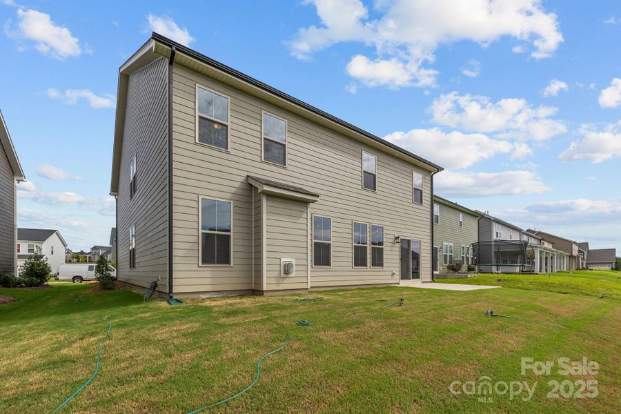 Front exterior of a new home in Lakeside Glen, York, SC, highlighting curb appeal (Image 17). Front exterior of a new home in Lakeside Glen, York, SC, highlighting curb appeal (Image 17).