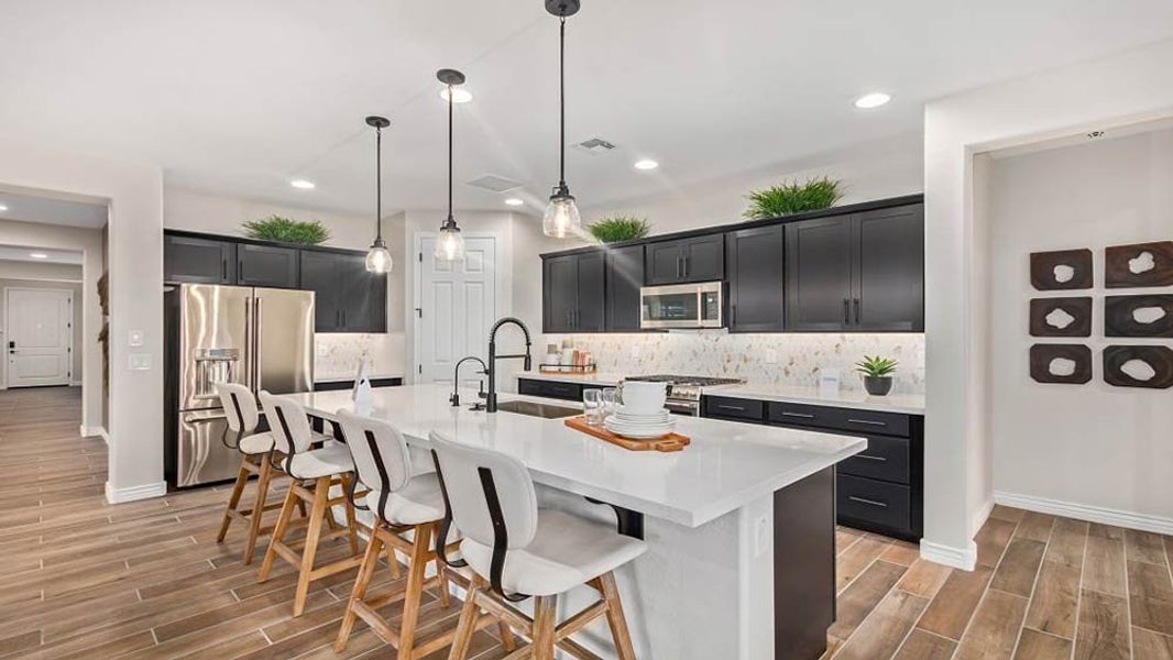 Representative furnished interior of a home built from the Hudson by Taylor Morrison in Paradisi Encore Collection, Surprise (Image 8). Representative furnished interior of a home built from the Hudson by Taylor Morrison in Paradisi Encore Collection, Surprise (Image 8).