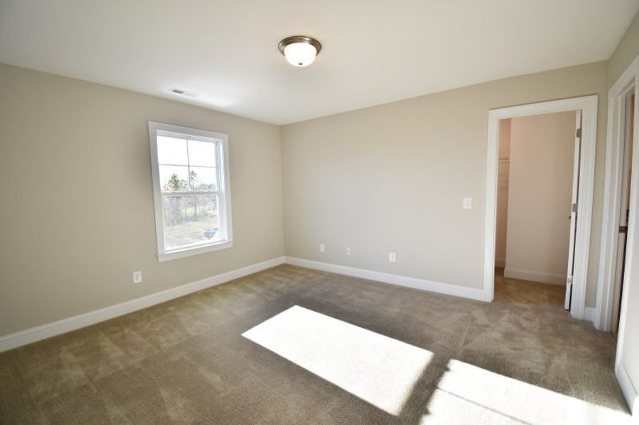 Representative unfurnished interior of a home built from the Lancaster by Keystone Homes NC in Preserve at Carriage Cove, Oak Ridge (Image 53).