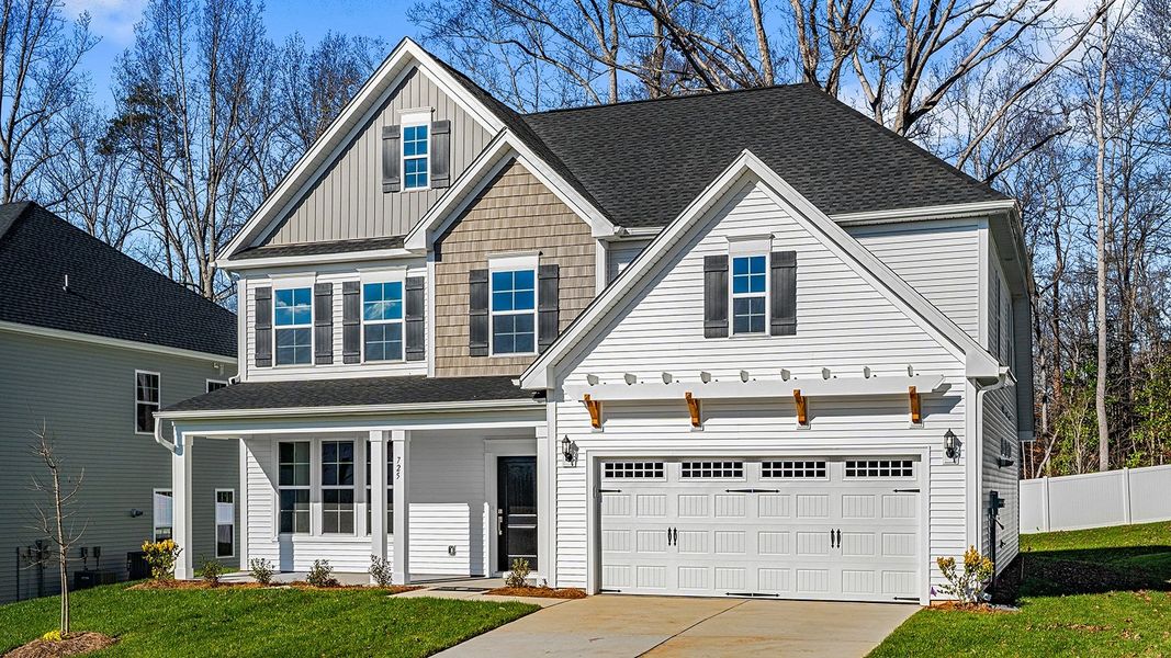 Front exterior of a new home in Hanes Lake, Winston-Salem, NC, highlighting curb appeal (Image 23).