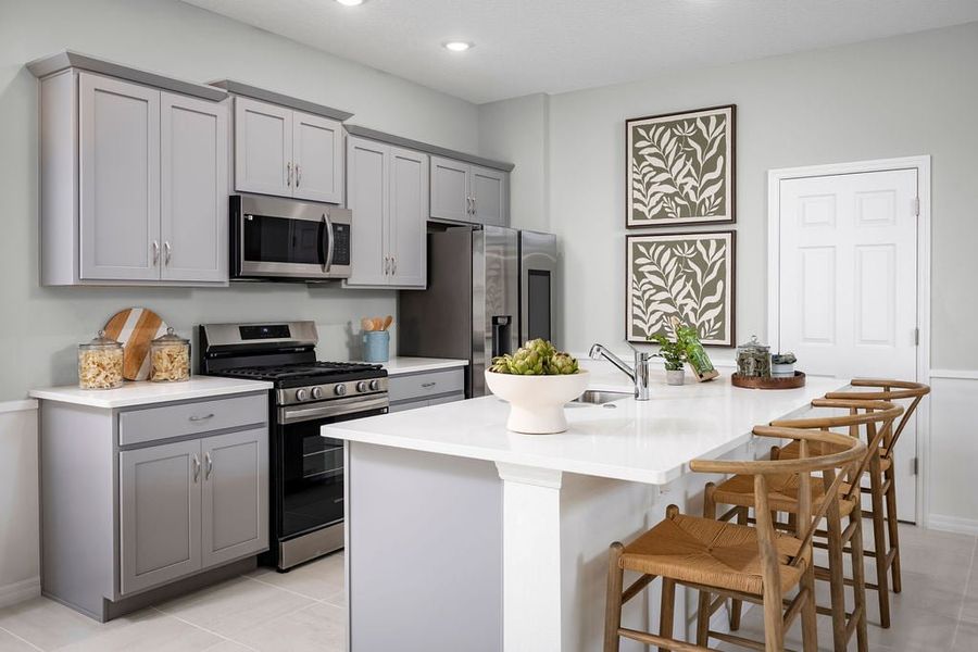 Representative furnished interior of a home built from the Luna by Risewell Homes in Hodges Reserve, Howey-in-the-Hills (Image 9).