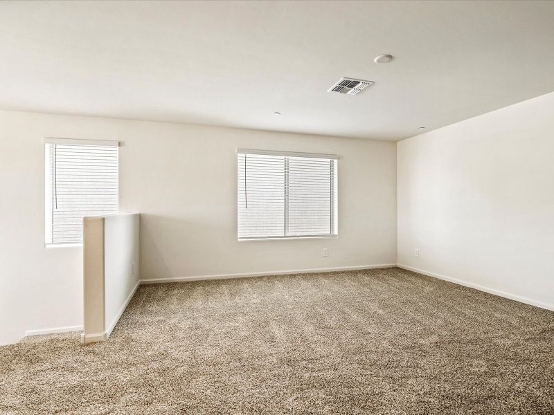 Spacious, unfurnished interior of a new home in Mandarina - Premier Series, Marana (Image 11).